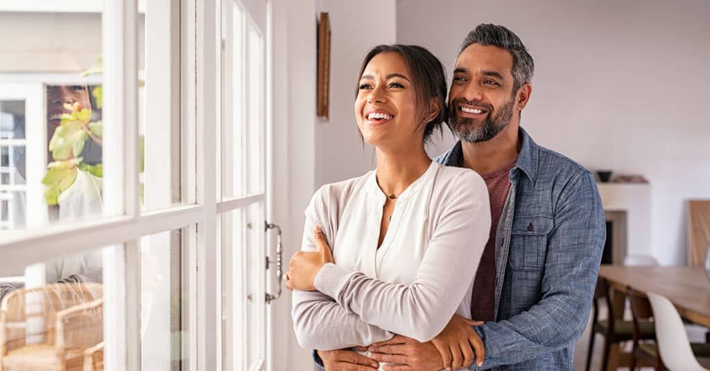 smiling couple embracing